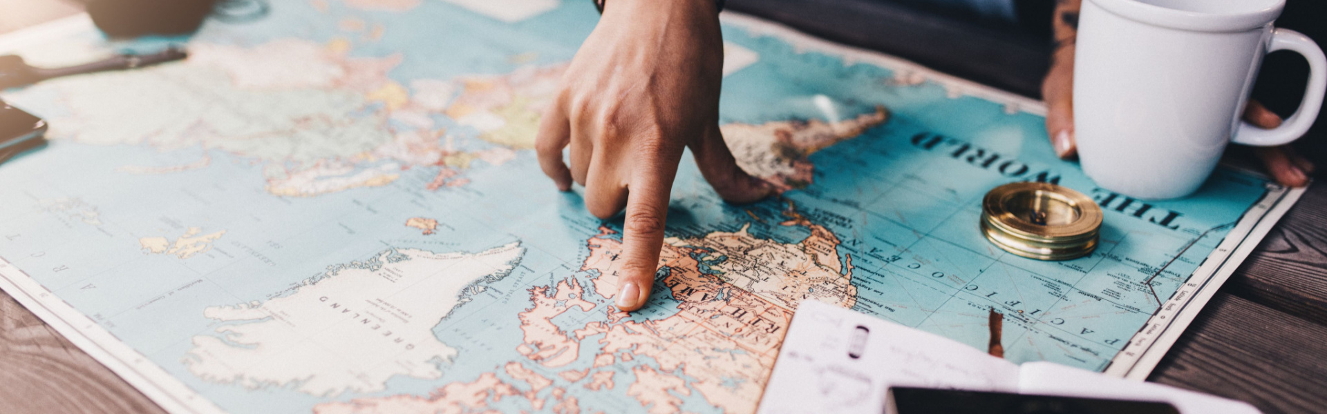 A person studying a map. 